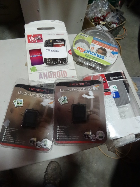 lot 270 image: LOT incl. 2 Android Cell Phones, 2 x Digital Picture Frames, Set Headphones. Phones are open box but appear new and unregistered.