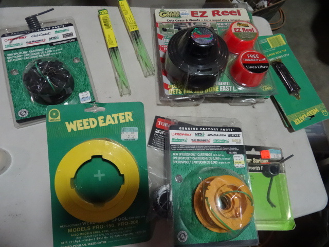 lot 275 image: NEW LARGE LOT Weed Eater Parts and Lube incl. $25 Grass Gator EZ Reel Replacement Reel, 10x Reels of Trim Line, 2x Weed Eater Quick Clip and MORE. Approx Retail. $100 retail