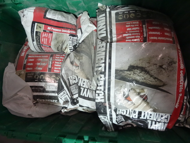 lot 283 image: NEW LOT approx 150  lbs Vinyl Cement Patch. Everything in the green bin. GREEN BIN NOT INCLUDED