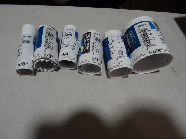 lot 298 image: NEW Qty 6 Shark Tooth Hole Saws 5  8 7  8 2x 3  4 1 and 1-5  8 inch sizes $49 Retail