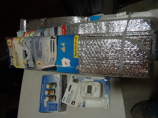 lot 26 image: NEW LOT Qty 3 Essential Oils and Qty 3 Car Reflective Solar Shades Qty 1 Digital Light Timer