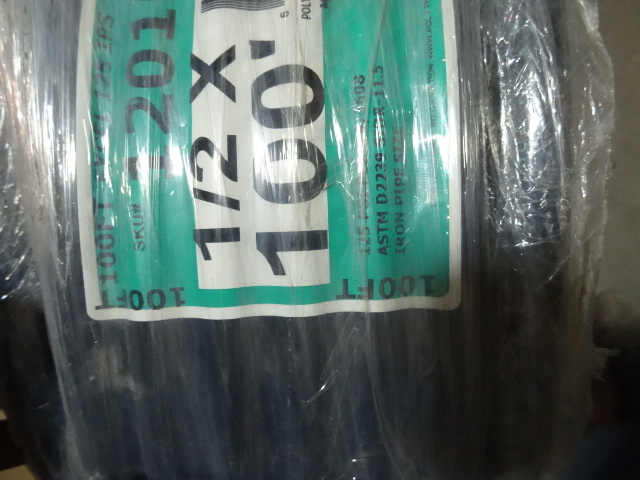 lot 32 image: NEW Roll 100ft 1  2 in Irrigation Pipe Black NSF