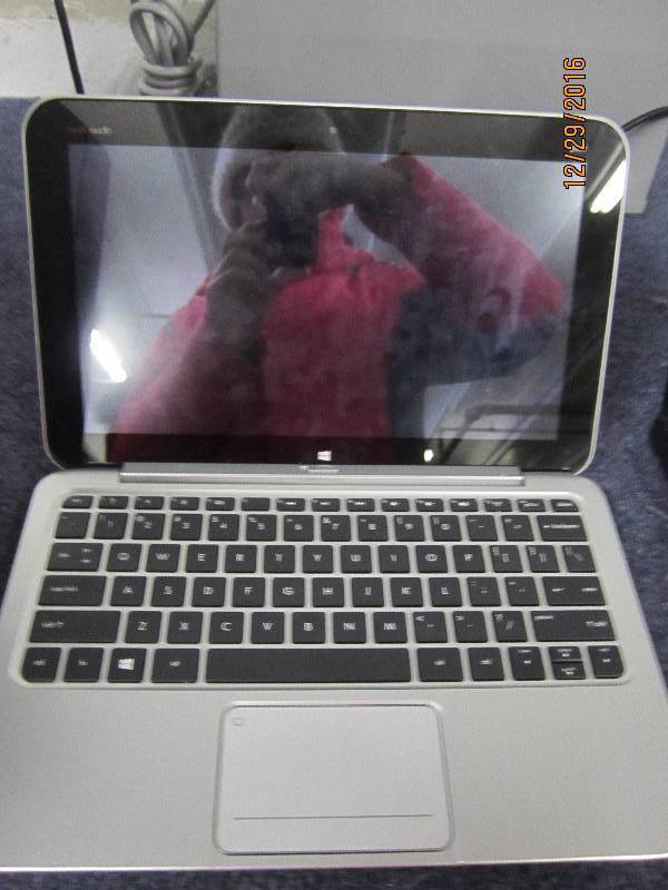 lot 38 image: Hp Hewlett packard silver laptop Be...