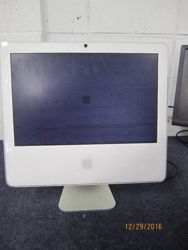 lot 54 image: Apple iMac, with web cam, screen is...