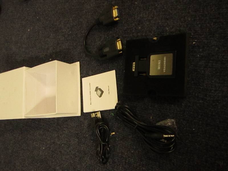 lot 75 image: VGA Adapter  looks new has cords no...