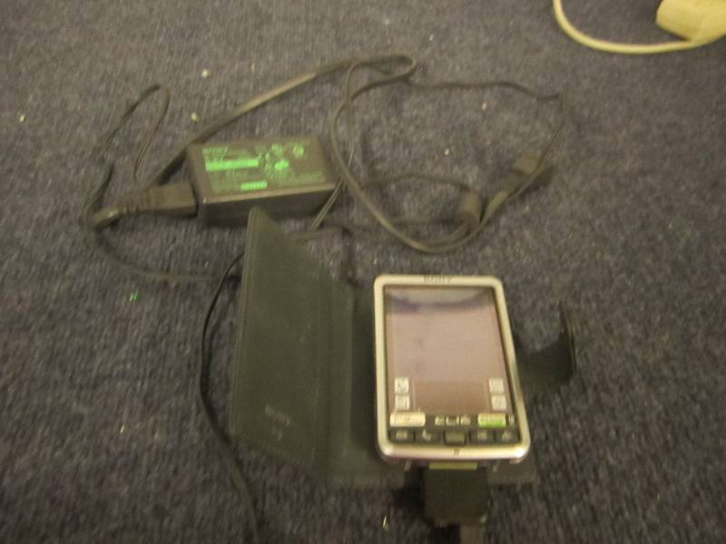 lot 91 image: Sony power adaptor PEGA-AC10 turns ...
