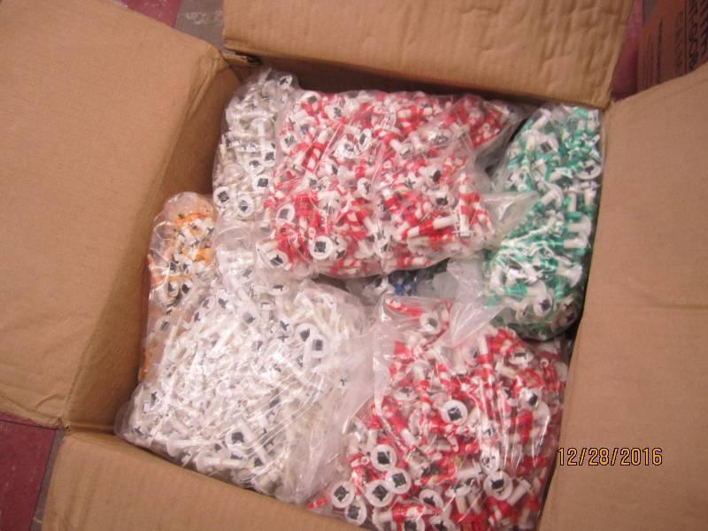 Case filled with seals and strings ...