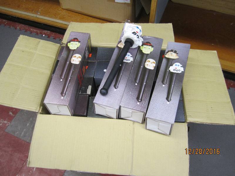 Box filled with assorted light stic...