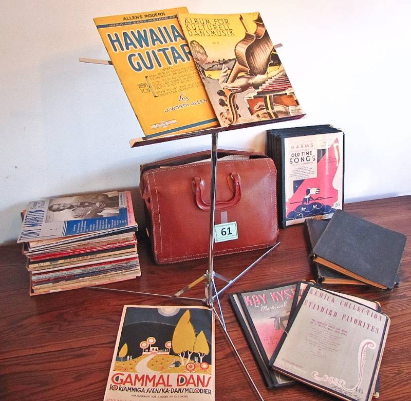 lot 61 image: music stand, sheet music and satchel