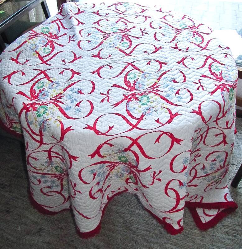 lot 73 image: red and white twin size bedspread