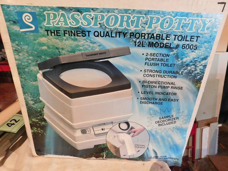 lot 41 image: passport potty NIB