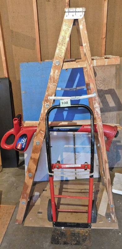 lot 108 image: ladder, trimmer, yardsticks and dolly