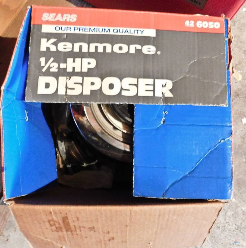 lot 112 image: NIB kenmore 12 HP disposer