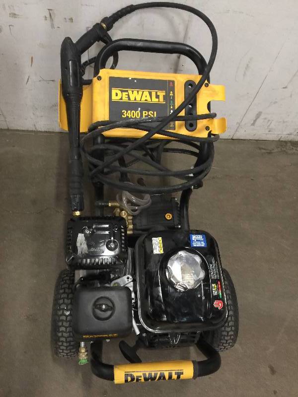 lot 67 image: DEWALT Honda GX200 3,400 psi 2.5 GPM Gas Pressure Washer Model#  DXPW3425  used in working conditions