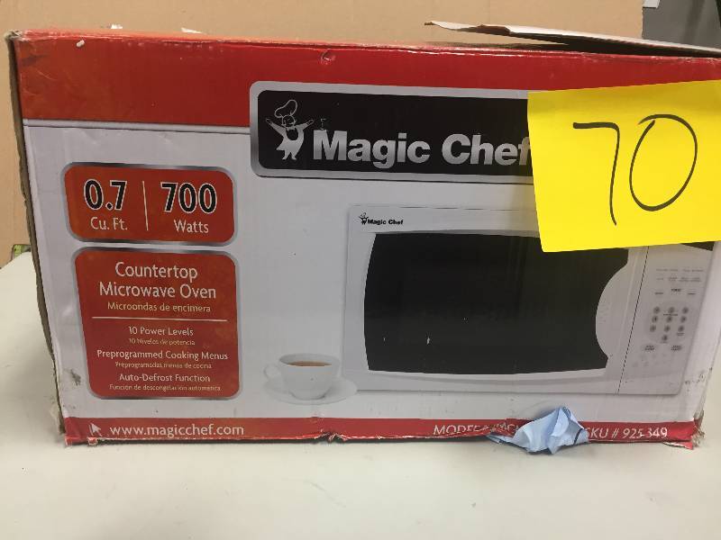 lot 70 image: Magic Chef 0.7 cu. ft. Countertop Microwave in White Model#  MCM770W1  open box never used