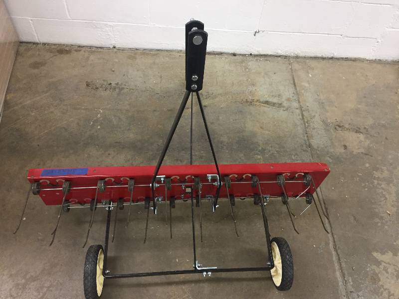 lot 130 image: Craftsman 40 in. Rear Mount Dethatcher  Model # 24315