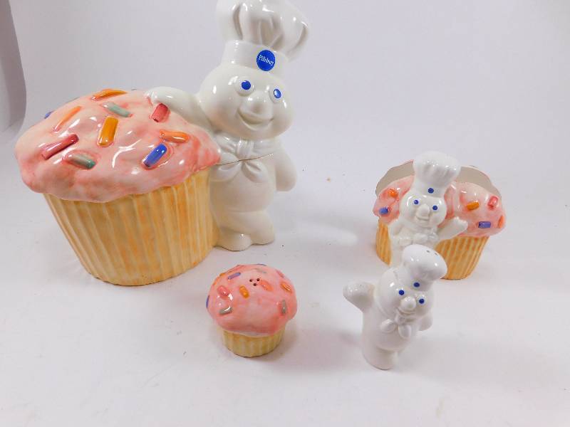 lot 52 image: Pillsbury Doughboy Ceramic Cookie Jar, Napkin Holder, and Salt & Pepper Shaker