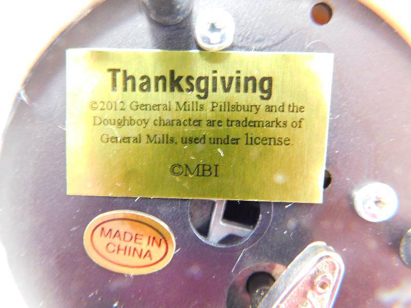 lot 60 image: Pillsbury Doughboy Music Box Figurine