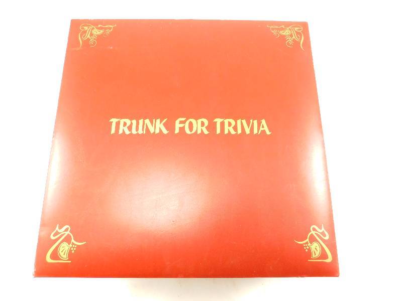 lot 13 image: Trunk for Trivia - Trivial Pursuit Board Game
