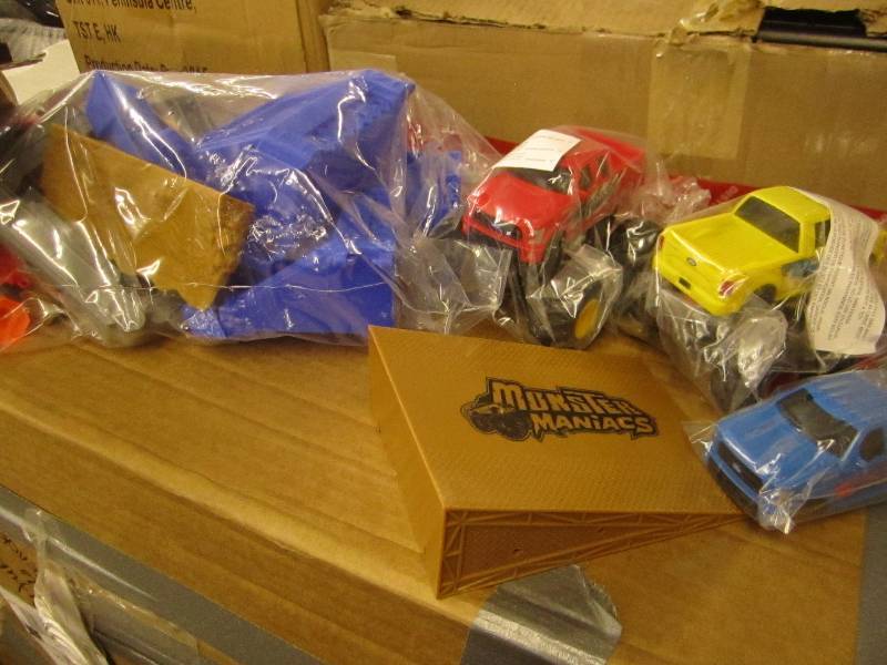 lot 15 image: Monster Trucks with Ramp...