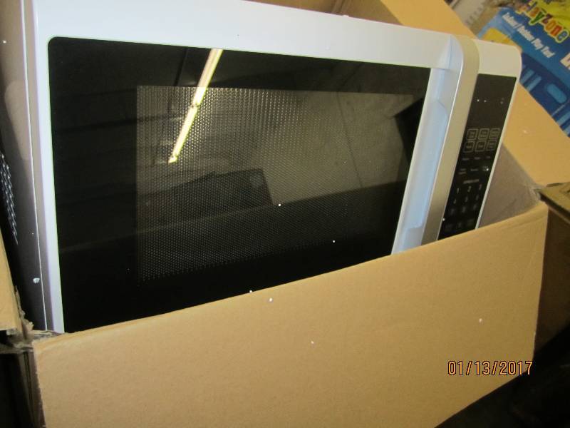 lot 137 image: Ginnys Brand Family Microwave open...