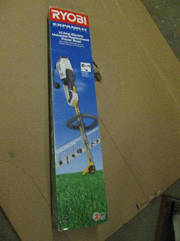 lot 1 image: Ryobi 10 amp elecctric power head c...