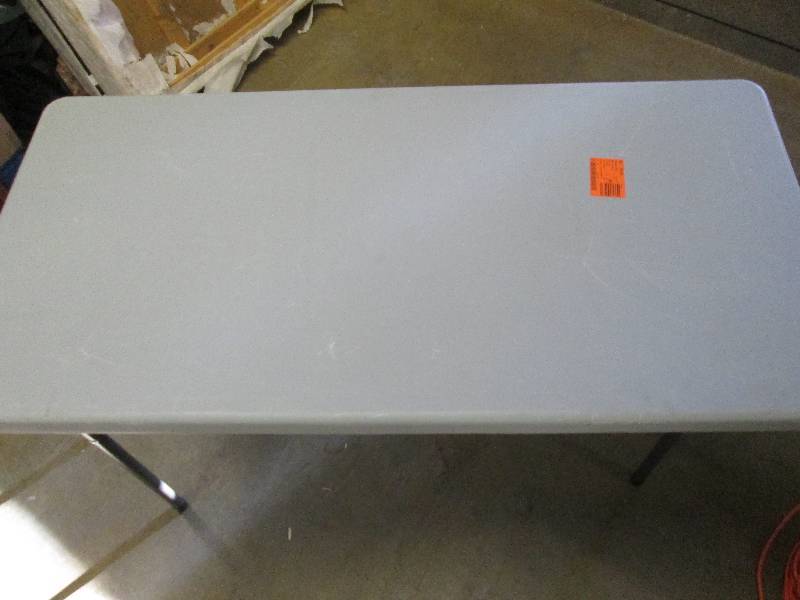 lot 101 image: 4 foot grey plastic table with meta...