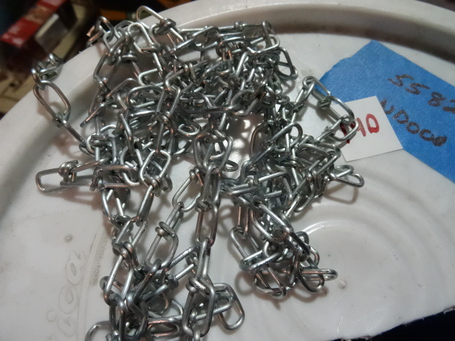 lot 140 image: NEW #3 Tenso Chain, Bright Zinc, Approx half bucket so approx 300 ft out of 700. $174 retail