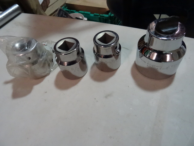 lot 29 image: NEW Qty 4 -  3  4 in Drive Sockets incl. Craftsman 1.25in socket, Craftsman 1-38 in socket, ACE 2 in socket and ACE 1-716 in socket