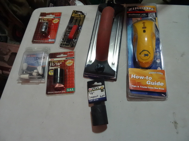 lot 49 image: NEW Tool Lot Incl. Stud Finder, Sanding Block, Sockets, and MORE.