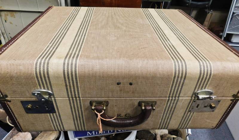 vintage suitcase full of beannies