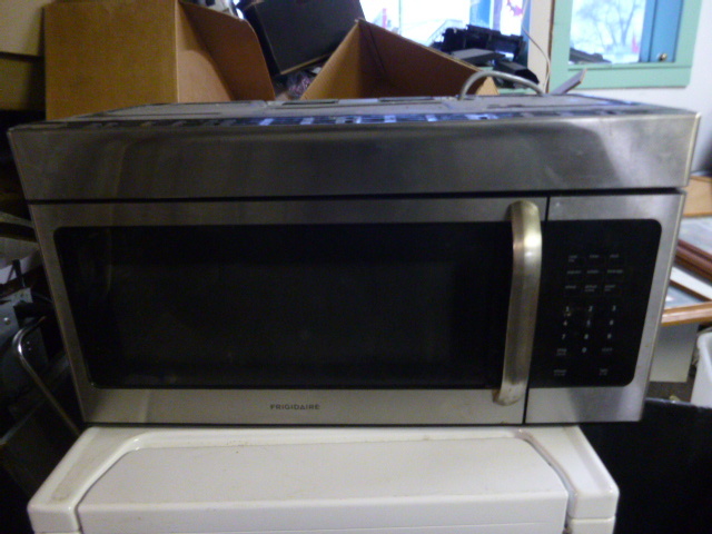 lot 11 image: Frigidaire Over the Stove Microwave