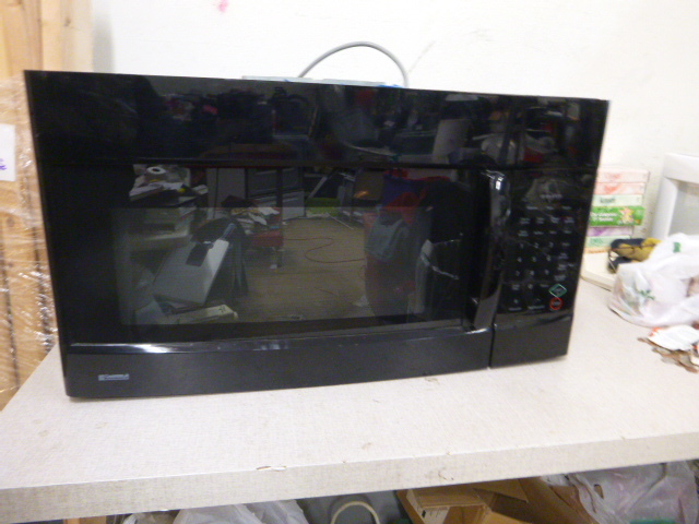 lot 12 image: Kenmore Over the Stove Microwave