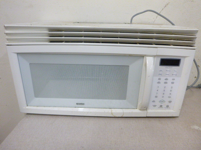 lot 13 image: Kenmore Over the Stove Microwave