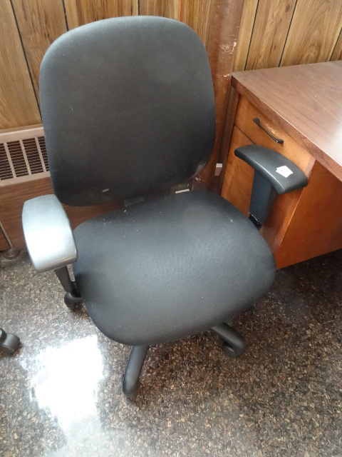 lot 63 image: Office chair on wheels....