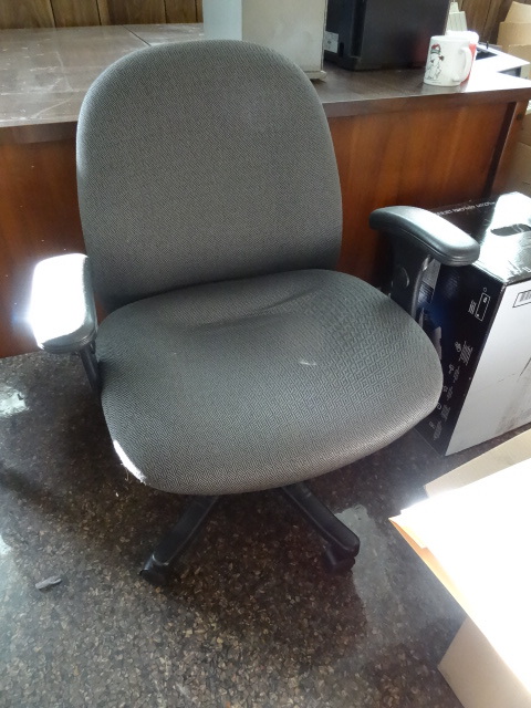 lot 64 image: Office chair on wheels....
