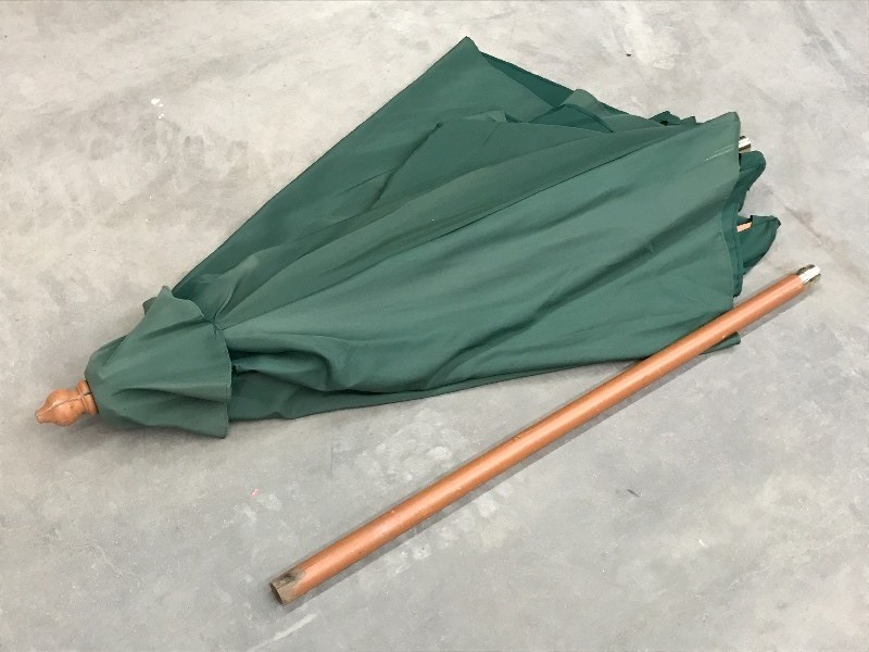 lot 92 image: (1) Unused Green Patio Umbrella ...
