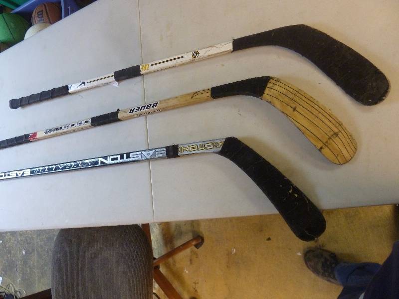 lot 102 image: Hockey Sticks