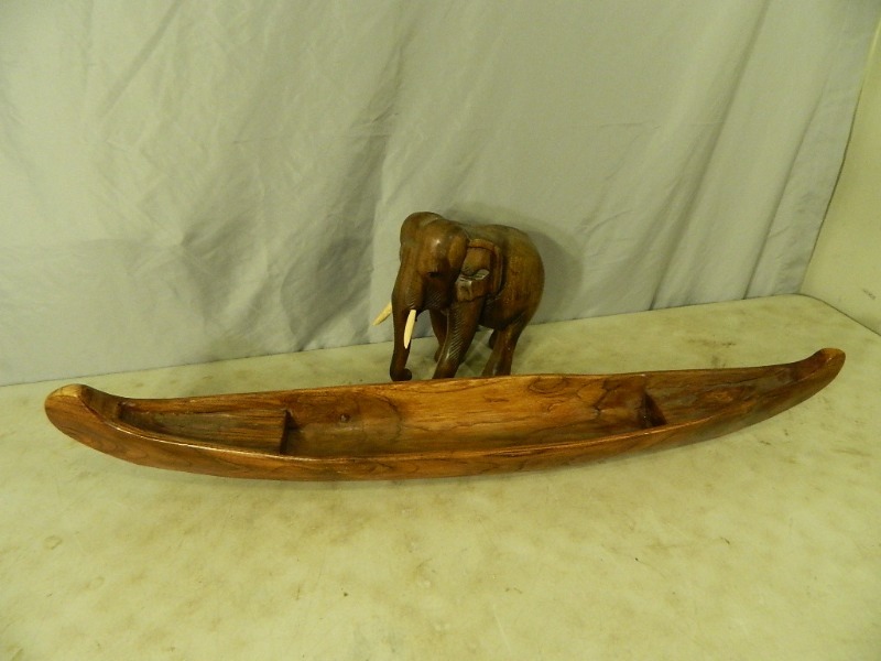 lot 38 image: Hand Carved Canoe and Elephant