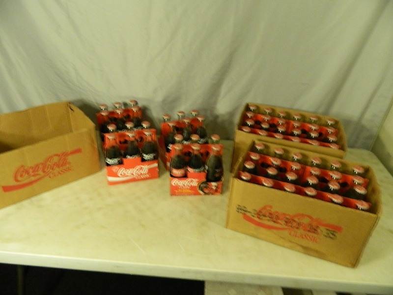 lot 40 image: Old Coca Cola Coke Bottles