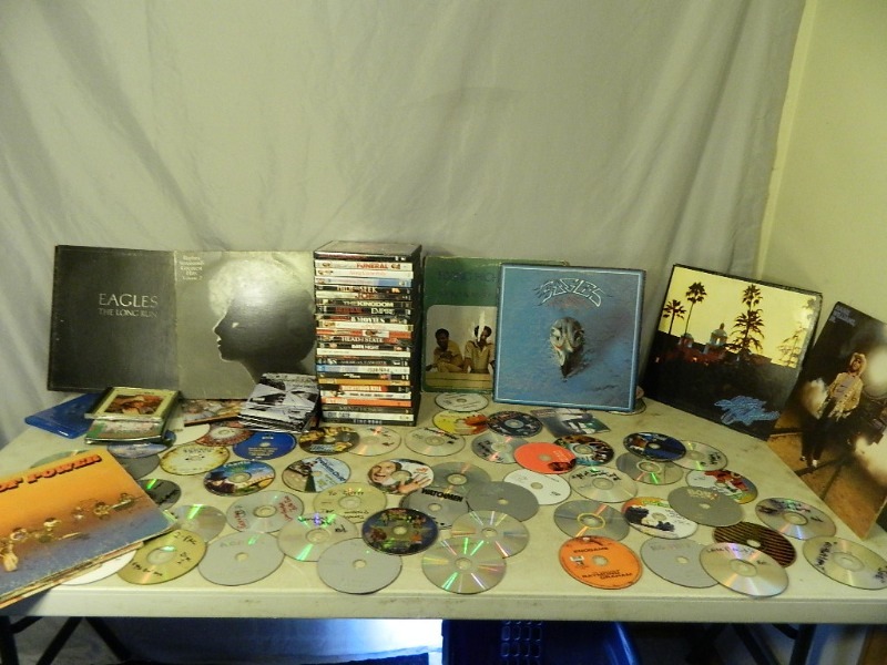 lot 91 image: Records, Dvds, and Cds