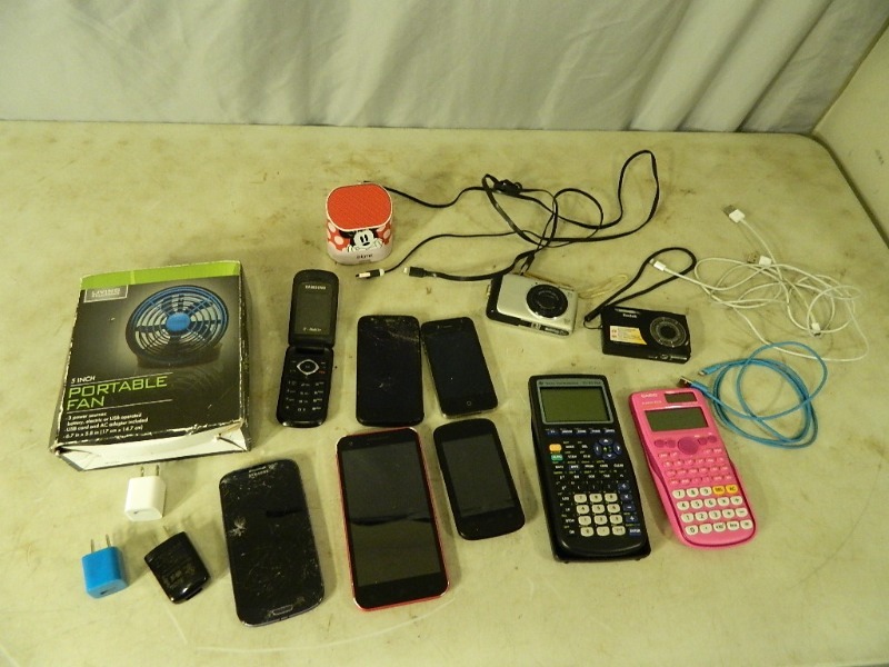 lot 121 image: Phones, Calculators, Camera and More