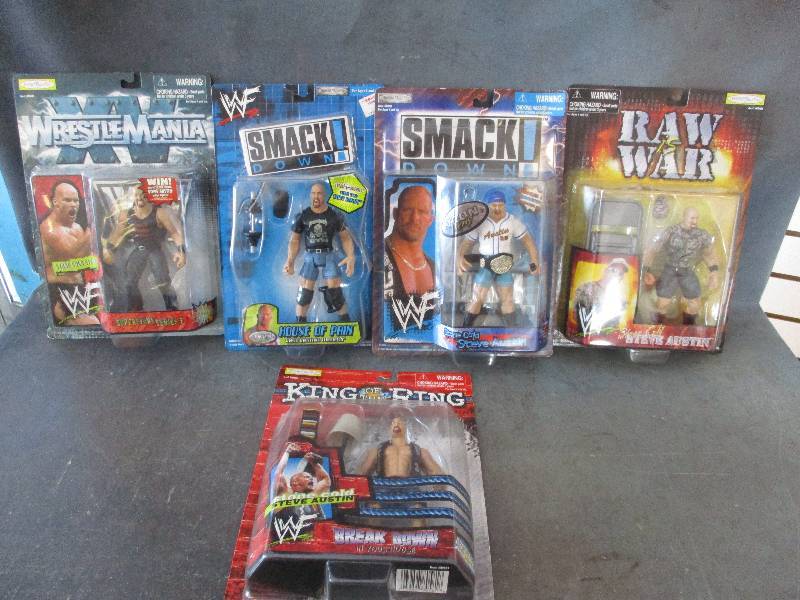 lot 175 image: 5 Wrestling Action Figures Of Stone Cold Steve Austin