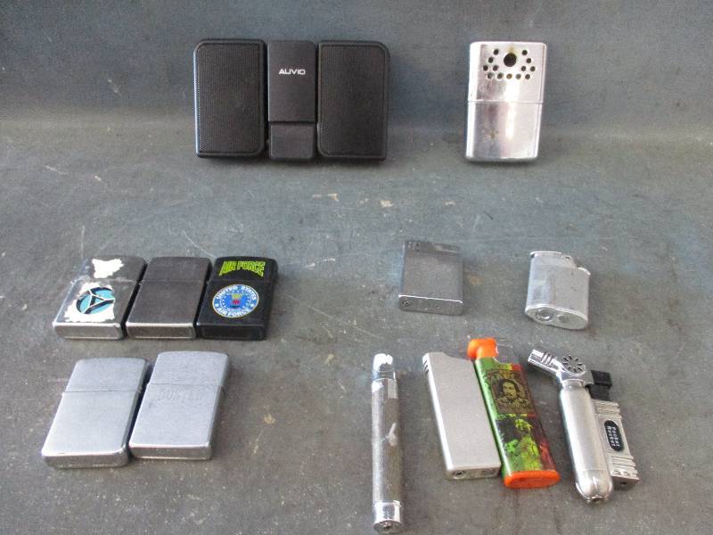lot 178 image: Zippos, Lighters & Speakers