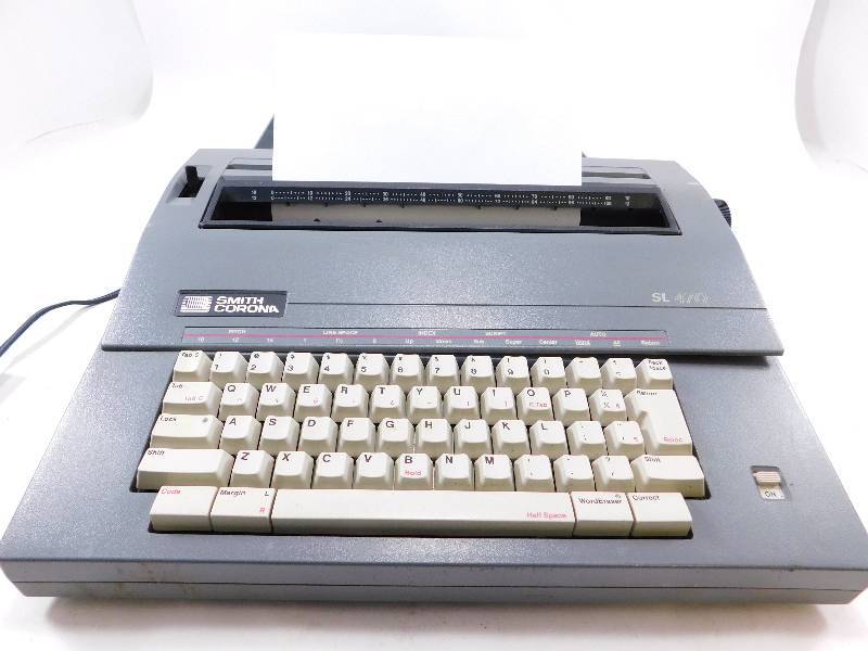lot 30 image: Smith Corona SL470 Electric Portable Typewriter