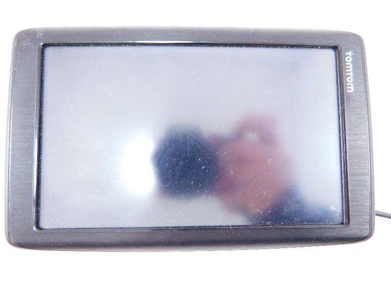 lot 34 image: TomTom - Tested, Works