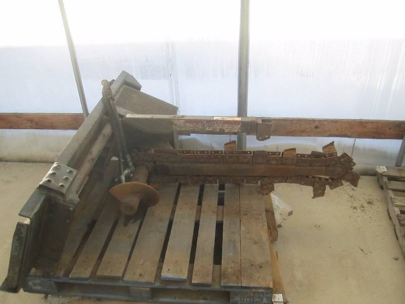 lot 9 image: Skid Loader 4-ft. Trencher Attachment