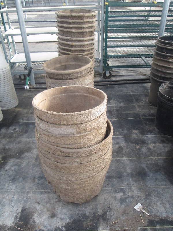 lot 33 image: Stacks of PotsPlanters
