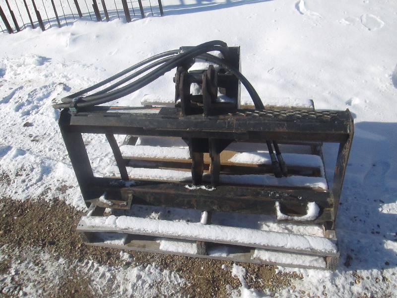 lot 8 image: Skid Loader Auger Attachment