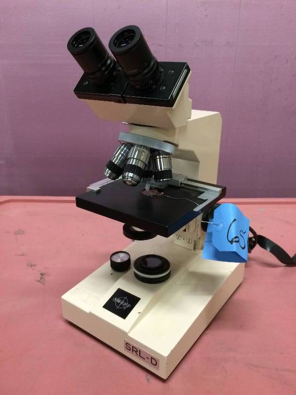 lot 1 image: WOW Retails Used $600 Super Nice Swift Binocular SRL-D 8156554 With 4 Objectives - Excellent Working Condition